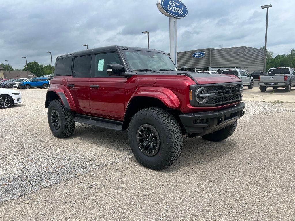2026 Ford Bronco Raptor in Ruby Red Metallic Tinted Clearcoat — front three-quarter view