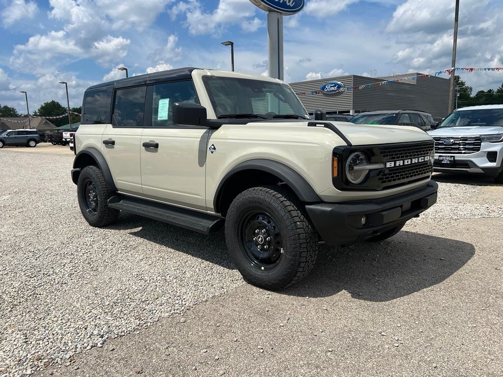 2026 Ford Bronco Outer Banks in Desert Sand — front three-quarter view