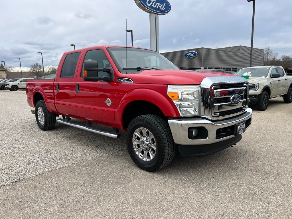 2013 Ford F-250 XLT in Vermillion Red — front three-quarter view
