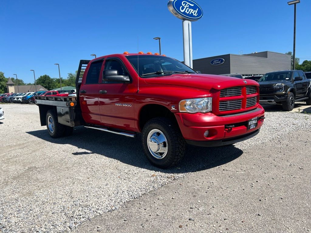 2003 Dodge Ram 3500 SLT DRW in Flame Red Clearcoat — front three-quarter view
